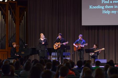Union students the congregation in a song during the Lenten Service. - Photo by Meg Rushing