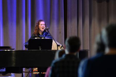 Melody Curtis helps lead worship in a chapel service. - Photo by Meg Rushing