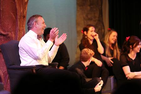 Dub Oliver, president of the university, laughs at one of the skits performed by Blank Slate Improv during "The Dub Show." - Photo by Kristi McMurry Woody