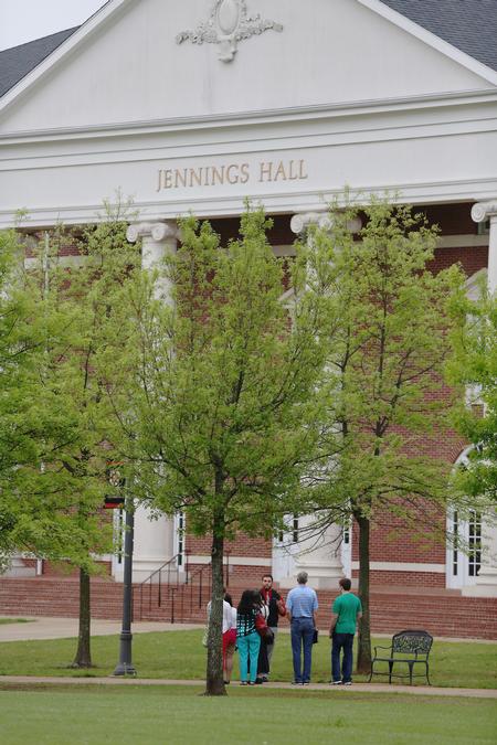 A tour group stops in front of Jennings Hall during a Preview Day. - Photo by Kristi McMurry Woody