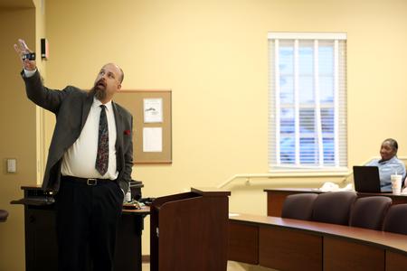 Micah Watson, associate professor of political science, speaks at the Town and Gown lecture series on “A Decent Proposal: Marriage, Pluralism and the Whole Counsel of God.” - Photo by Amanda Rohde