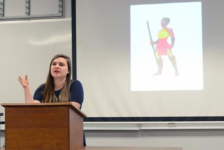 Emilie Malone, senior art studio major, answers questions at the end of her presentation during the art section of the Scholarship Symposium in the Penick Academic Complex. - Photo by MiKalla Cotton