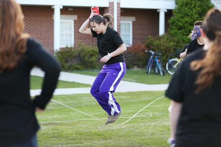 Students participate in a jump rope game as part of Residence Life's Field Day.  - Photo by Kristi McMurry Woody