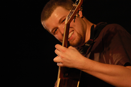 Jason Fitts plays guitar as his band performs for Union students during Fall Fest '04. - Photo by Jonathan Blair