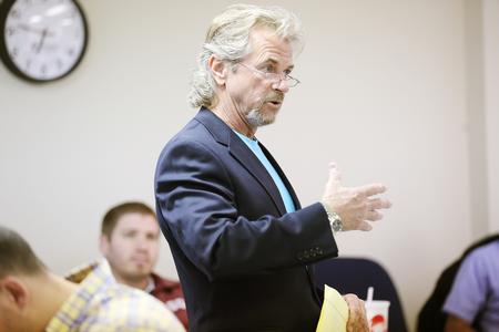 Steve Arendall, director of the MBA program on the Germantown campus, teaches a class. - Photo by Kristi McMurry Woody