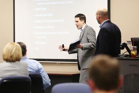 Students make their final presentation to a local non-profit during their last MBA class on the Germantown campus. - Photo by Kristi McMurry Woody