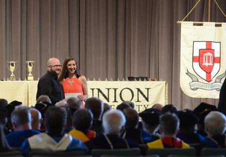 Katelyn Walls, junior Christian thought and tradition and English literature double major, receives the Barnabas Leadership award during Awards Day Chapel. - Photo by MiKalla Cotton