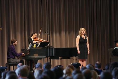 Logan Brasher, senior music major, Paige Tang, senior music major, and Hillarie Henderson, senior music education major, perform at the opening of Awards Day chapel.  - Photo by Kristi McMurry Woody