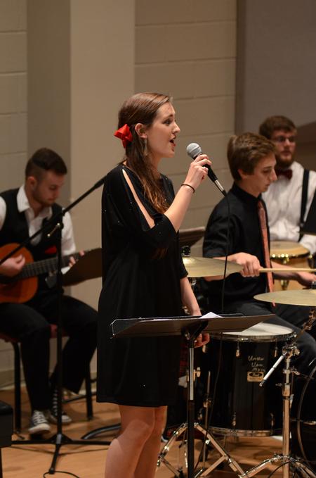Autumn Hitt, senior philosophy major, sings with the Union University Jazz Band in a concert in Hartley Hall. - Photo by Meg Rushing