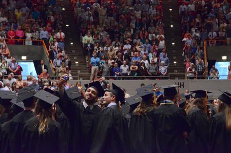 Bachelor of science in business administration graduates, Pedro Faller (left) and Dalton DeLuca (right), pose for a photo before spring commencement services begin. - Photo by MiKalla Cotton