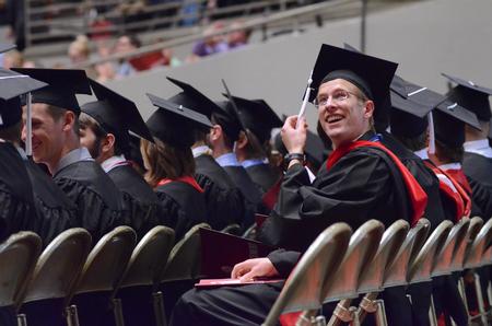 Stephen Wunrow, bachelor of arts in biblical studies languages with honors graduate, smiles as spring commencement services begin. - Photo by MiKalla Cotton
