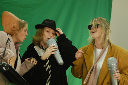 Sophomores Karie Thomas, Allison Steele and Andrea Sarine make a music video during Fall Fest 2004. - Photo by Jonathan Blair