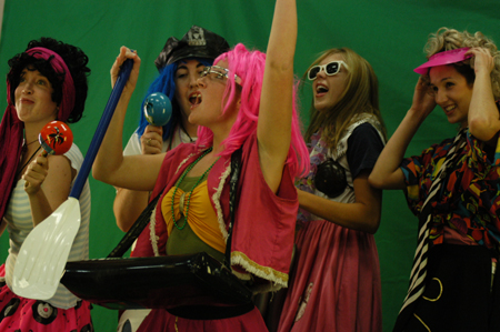 Freshman Carolyn Negley and her roommates make a music video toghether during Fall Fest 2004. - Photo by Jonathan Blair