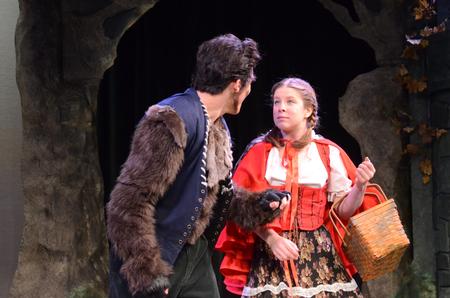 Eddie Echeverria, sophomore political science major, and Rebecca Leet, junior vocal music education major, play the wolf and Little Red in the Union Players' production of Into the Woods. - Photo by Emily Stookey