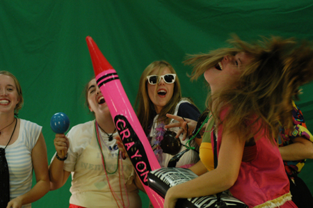 Freshman Carolyn Negley and her roommates make a music video toghether during Fall Fest 2004. - Photo by Jonathan Blair