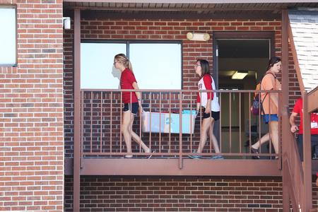 Student leaders help new students move into their rooms on move-in day. - Photo by Kristi McMurry Woody