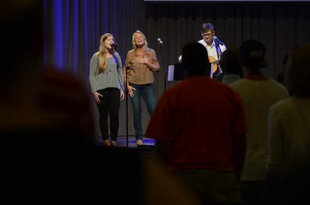 Meg Rushing, senior public relations major, and Jill and William Donnell from Northbrook Church lead worship at the chapel service during Welcome Week in the G.M. Savage Memorial Chapel. - Photo by MiKalla Cotton