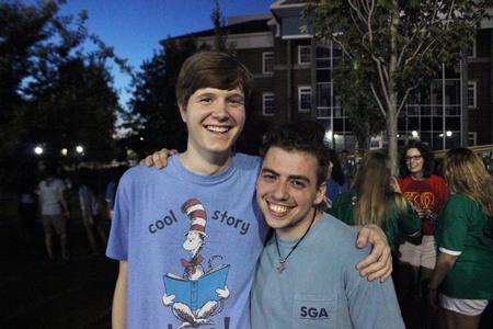Thomas Gray, sophomore broadcast major, and Andrew Graham, senior art major pose for a picture at the Howdy Party hosted by the Student Government Association.  - Photo by Sol Bee Park