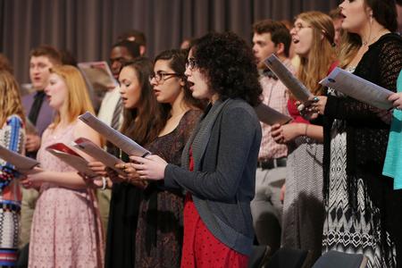 University Singers lead the congregation in a song during Convocation. - Photo by Kristi McMurry Woody