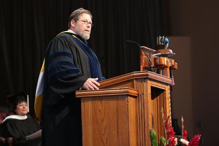 Ben Mitchell, provost and vice president for academic affairs, welcomes the congregation to Convocation in the G.M. Savage Memorial Chapel. - Photo by Kristi McMurry Woody