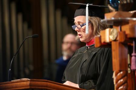 Jennifer Graves, director of the Union EDGE program, reads scripture during Convocation. - Photo by Kristi McMurry Woody