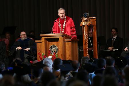 Dub Oliver, president of the university, speaks during Convocation in the G.M. Savage Memorial Chapel. - Photo by Kristi McMurry Woody