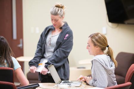 Nursing students on the Hendersonville campus mingle during a break from class. - Photo by Kristi McMurry Woody