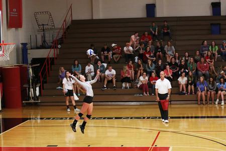 Hannah Huguley serves the ball as students watch a great match between the Lady Bulldogs and Lady Dragons of Lane College. - Photo by Kristi McMurry Woody