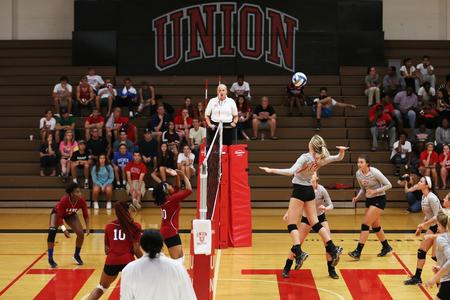 Casi Neff spikes the ball during a volleyball game against Lane College. The Lady Bulldogs won 3-0. - Photo by Kristi McMurry Woody