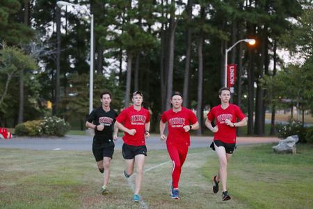 Cross Country runners finish up an early practice on campus. - Photo by Kristi McMurry Woody