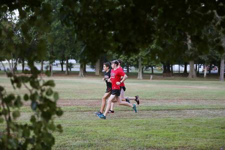 The cross country team runs on the Union University XC course. - Photo by Kristi McMurry Woody