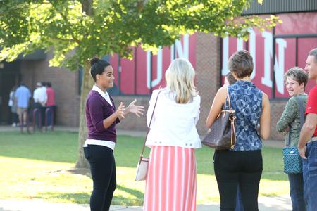 Morgan Moody, junior English major, gives a tour to prospective students and their families on Day at the U. - Photo by Kristi McMurry Woody