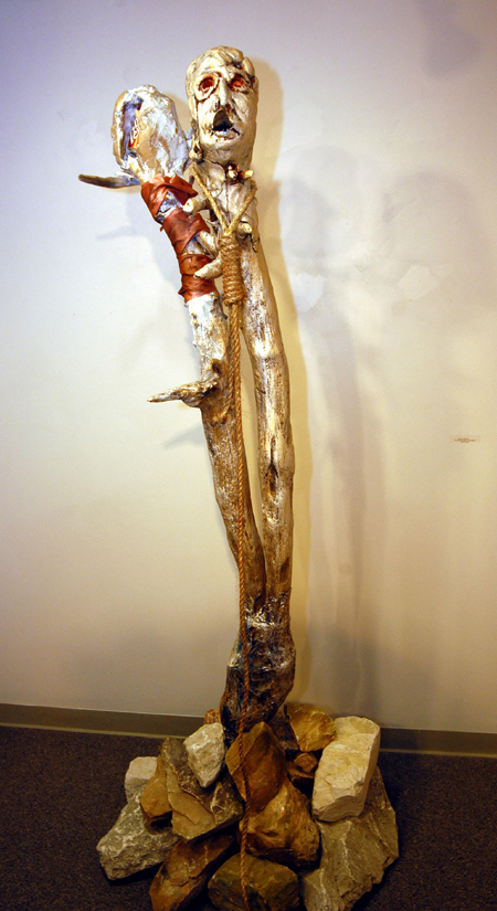 Union art department faculty members displayed their work in the Union University Art Gallery during the month of November. This mixed media piece by Lee Benson is called "Art of Our Groans: Love Hurts." - Photo by Morris Abernathy