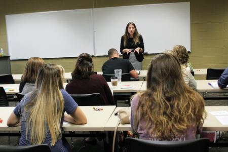 The speaker at the Grad School Prep series gives students useful tips on testing and admissions preparations.  - Photo by Sol Bee Park