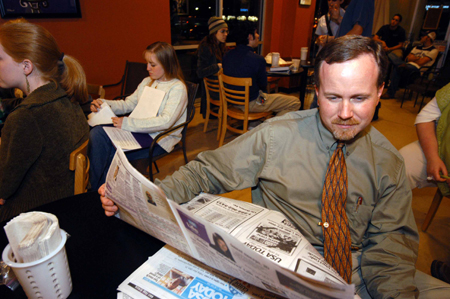 Political science professor Kevin Cooney joined students at Bubba's Bagels as they watched returns on election night. - Photo by Morris Abernathy