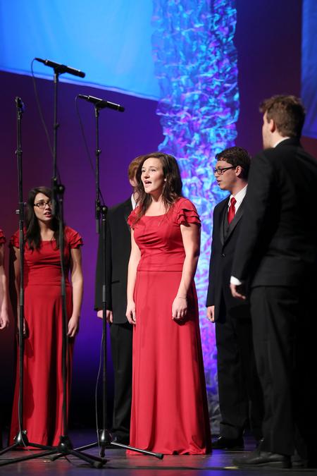 Abigail Peecher, sophomore music performance major, sings a solo during the Proclamation performance at the 18th annual Scholarship banquet. - Photo by Kristi McMurry Woody