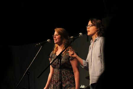 Elizabeth Tomyn and Alexis Piscatello, senior music majors, sing a harmonious duet at Open Mic. - Photo by Sol Bee Park