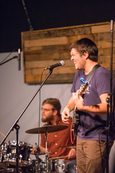 Cameron Skonhovd, junior psychology major, gives his best performance alongside sophomore drummer David Key. - Photo by David Parks