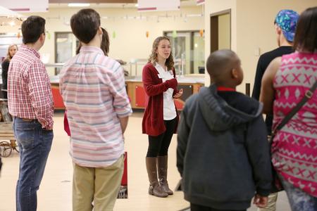 Rachel Pratt, sophomore student ambassador, leads a tour group through the Brewer Dining Hall during a Bulldog Day. - Photo by Kristi McMurry Woody
