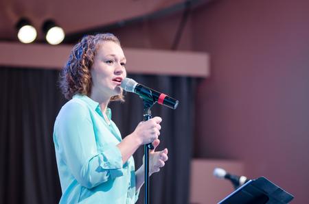 A singer in the Bellevue Baptist Church worship band helps lead the congregation in song in the G.M. Savage Memorial Chapel. - Photo by David Parks