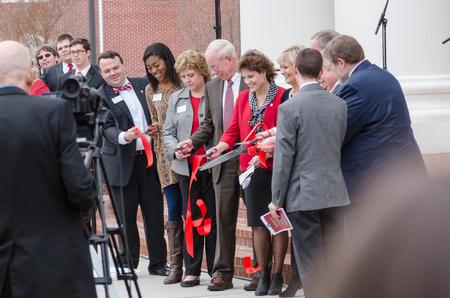 The red ribbon is cut by primary donors and faculty, signifying the opening of the Logos during its dedication ceremony.  - Photo by David Parks