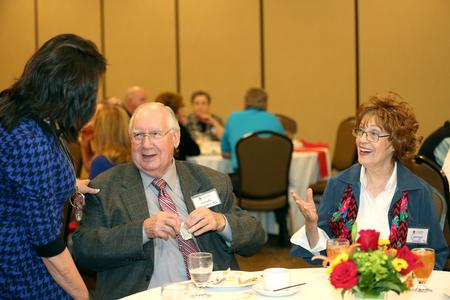 Alumni enjoy snacks and conversation at the Decades Reunion during Homecoming.  - Photo by Kristi McMurry Woody