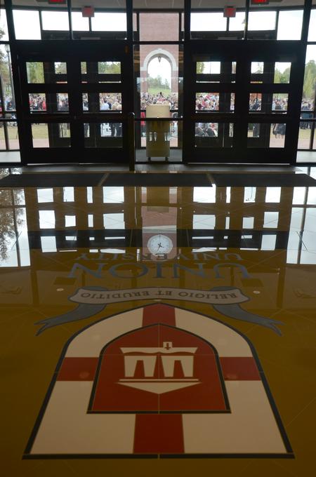 The Logos library dedication takes place outside. - Photo by MiKalla Cotton