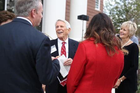 The Olivers and the Latimers chat before the dedication of The Logos, which was funded with a lead donation by The Latimer Foundation. - Photo by Kristi McMurry Woody