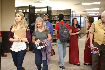 Guests tour the new library building, The Logos, for the first time during Homecoming weekend. - Photo by Kristi McMurry Woody