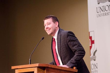 Distinguished Achievement Award in Business recipient Chad P. Wilson joyfully thanks those who helped him become successful.  - Photo by David Parks