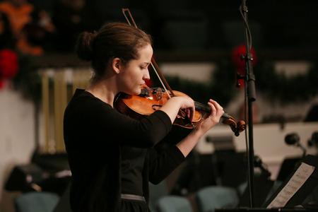 Grace Carbonell, senior music major, performs Carol of the Bells during the second fall commencement service.  - Photo by Kristi McMurry Woody