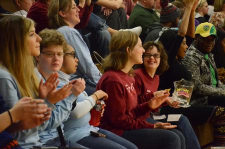 Kelsey Layman, EDGE student, and Kate Pryor, junior special education major, talk as the EDGE program cheers on the Lady Bulldogs in the Fred Delay Gymnasium.  - Photo by MiKalla Cotton