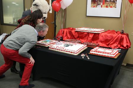 Dub and Susie Oliver, president and first lady of the university, join Buster in blowing out the candles at Union's 193rd birthday party. - Photo by Kristi McMurry Woody