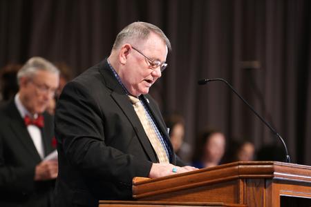 Charles Baldwin, long time chemistry professor, reads scripture during Founders' Day chapel. - Photo by Kristi McMurry Woody